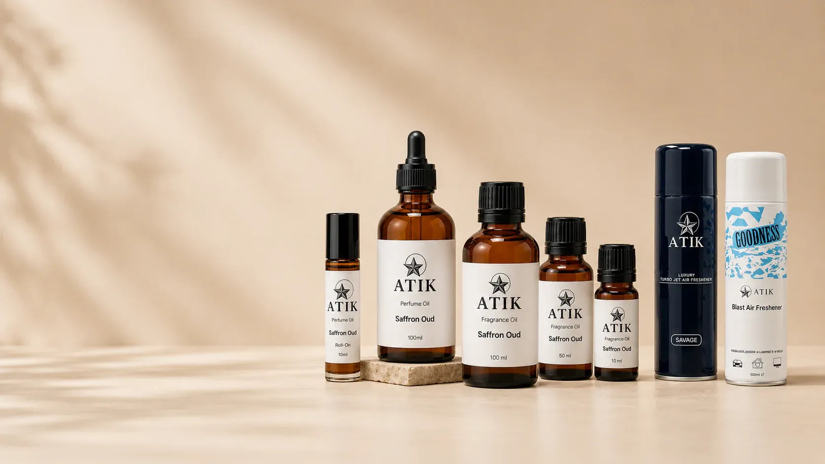 Atik mix fragrance products on a warm lighting background